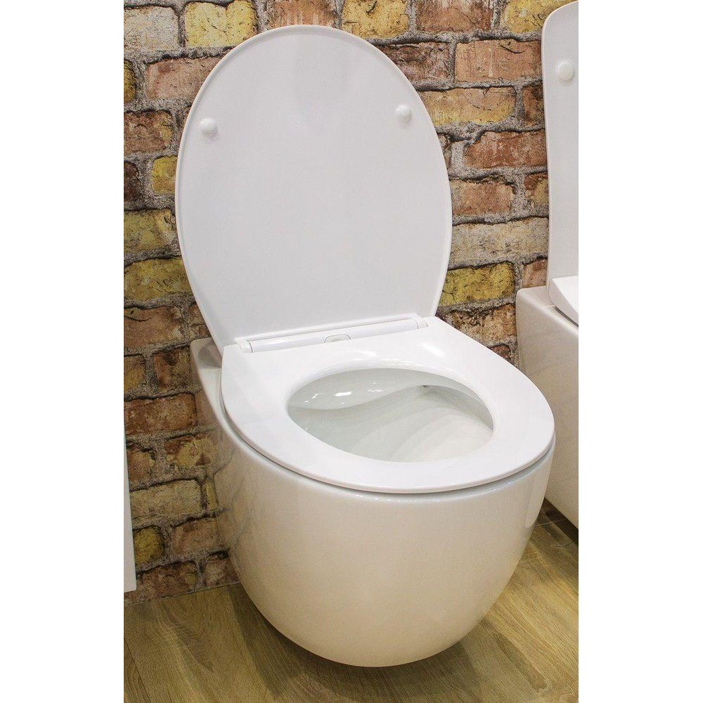 Купить Унитаз подвесной Art&Max Elegant AM9316CHR/SC безободковый, с микролифтом, белый в Москве с доставкой Унитаз подвесной Art&Max Elegant AM9316CHR/SC безободковый, с микролифтом, белый